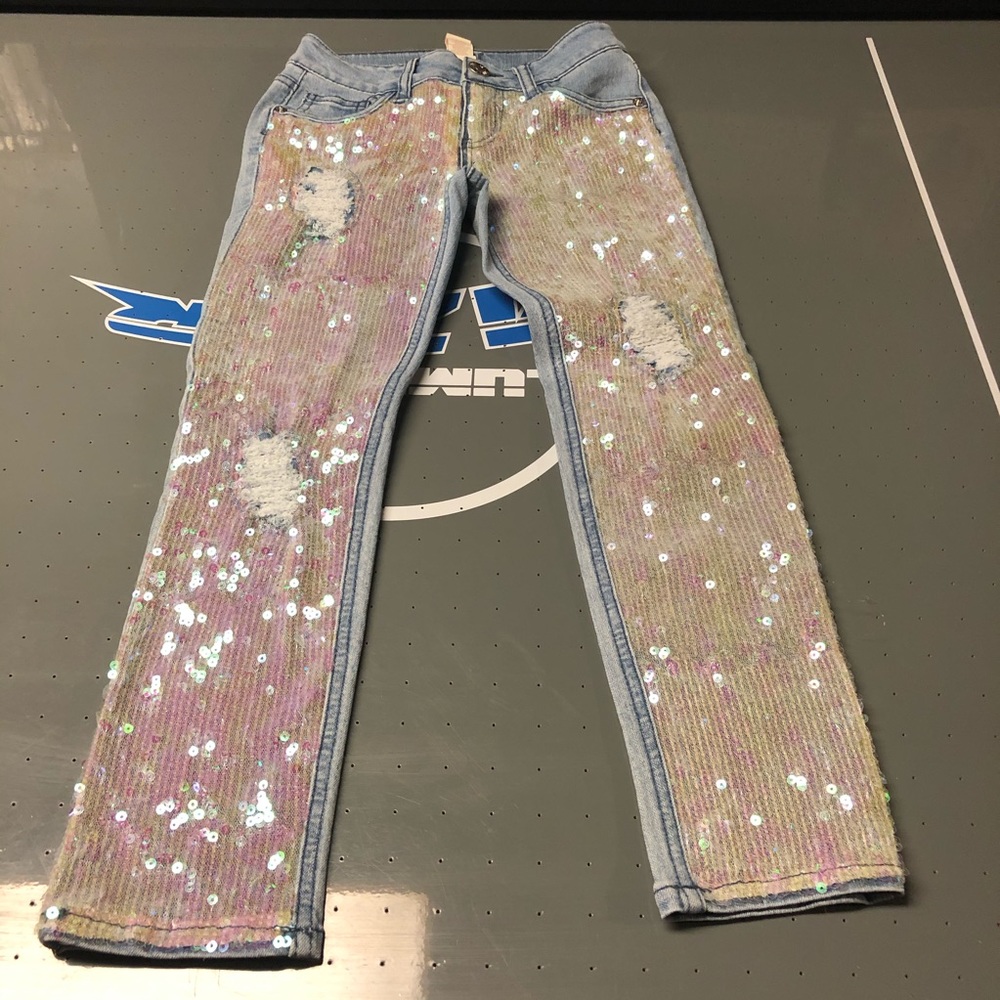 Sequence distressed jeans.
